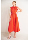 Woman wearing a red dress against a white background
