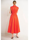 Woman wearing a red dress against a white background