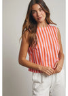 Woman wearing a sleeveless red and white striped top against a plain background