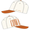 White and orange cap with 'Cowboy' text on a white background