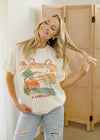 Woman wearing a 'The Beach Boys' t-shirt in a casual setting